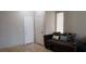 Comfortable living room with tile floors and neutral walls at 857 Lantham Pl, Las Vegas, NV 89110