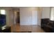 Inviting living room featuring tile flooring and neutral walls at 857 Lantham Pl, Las Vegas, NV 89110