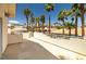 Spacious balcony surrounded by beautiful palm trees with views of the neighborhood at 8838 Spanish Mountain Dr, Las Vegas, NV 89148