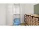 Walk-in closet with built-in shelving and a rod, providing ample storage space with neutral walls and carpet at 8838 Spanish Mountain Dr, Las Vegas, NV 89148