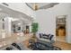 Open concept living space features high ceilings, elegant columns, and seamless transition to the dining and living areas at 8838 Spanish Mountain Dr, Las Vegas, NV 89148
