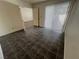 This bedroom features tile flooring, vertical blinds, and neutral paint at 8940 Clairton Ct, Las Vegas, NV 89117