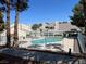 Community pool with nearby buildings at 8940 Clairton Ct, Las Vegas, NV 89117