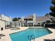 Community pool and hot tub with lounge area at this lovely well-maintained property in a desirable location at 8940 Clairton Ct, Las Vegas, NV 89117