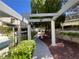 Charming walkway with lush greenery, creating a serene and inviting atmosphere at 8940 Clairton Ct, Las Vegas, NV 89117