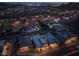 Dusk aerial shot shows a community with pools and mountain views at 9 Reverie Heights Ave, Henderson, NV 89011