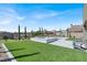 A backyard featuring a zero-scaped yard and jacuzzi with great landscaping and a desert view at 9 Reverie Heights Ave, Henderson, NV 89011