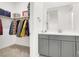 Walk-in closet with custom shelving and storage solutions, maximizing space and organization in the primary suite at 9 Reverie Heights Ave, Henderson, NV 89011