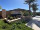 Welcoming entrance to Reverie, featuring stone accents and lush desert landscaping at 9 Reverie Heights Ave, Henderson, NV 89011