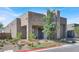 Modern home featuring stone accents and desert landscaping creates inviting curb appeal at 9 Reverie Heights Ave, Henderson, NV 89011