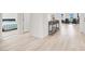 Light-filled hallway showcases modern decor, access to bedroom and open-concept living space at 9 Reverie Heights Ave, Henderson, NV 89011
