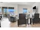 Bright living room includes backyard views, modern furniture, and seamless indoor-outdoor living at 9 Reverie Heights Ave, Henderson, NV 89011