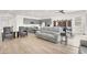 Open-concept living space flows between kitchen, dining, and living area featuring sleek finishes at 9 Reverie Heights Ave, Henderson, NV 89011