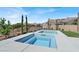 Inviting backyard featuring a modern pool and spa with desert landscaping and blue sky at 9 Reverie Heights Ave, Henderson, NV 89011