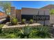 Community entrance sign for Reverie, featuring desert plants and stonework at 9 Reverie Heights Ave, Henderson, NV 89011