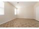 Bright bedroom featuring neutral walls, tiled flooring and bright natural light at 9001 Picket Fence Ave, Las Vegas, NV 89143