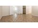 Spacious bedroom featuring neutral walls, tiled flooring, and ample closet space at 9001 Picket Fence Ave, Las Vegas, NV 89143