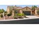 Charming single-story home featuring a well-maintained yard and two-car garage at 9001 Picket Fence Ave, Las Vegas, NV 89143