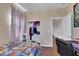 Bedroom with an open closet and doorway to a hallway at 9335 Tonkawa Ave, Las Vegas, NV 89178