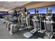 Well-equipped gym with treadmills, elliptical machines, and floor to ceiling windows overlooking the city at , Henderson, NV 89012
