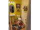 Charming powder room with pedestal sink, decorative mirror, and a vibrant color scheme at 10023 Liberty View Rd, Las Vegas, NV 89148