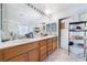 Bathroom vanity with double sinks and medicine cabinet storage at 10143 Canyon Hills Ave, Las Vegas, NV 89148