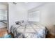 Bright bedroom featuring wood floors and staircase views at 10143 Canyon Hills Ave, Las Vegas, NV 89148