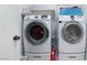Modern laundry room featuring a Samsung washer and dryer, offering convenience and efficiency at 10143 Canyon Hills Ave, Las Vegas, NV 89148