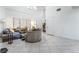 Bright living room with modern decor, high ceilings, and plenty of natural light at 10143 Canyon Hills Ave, Las Vegas, NV 89148
