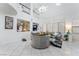 Bright living room featuring high ceilings and an open-concept design at 10143 Canyon Hills Ave, Las Vegas, NV 89148