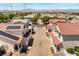 Aerial view of a community featuring solar panels on rooftops, mature trees, and well-maintained streets, perfect for families at 10276 Cherry Brook St, Las Vegas, NV 89183