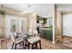 Eat in dining area open to kitchen and offering plenty of natural light at 10276 Cherry Brook St, Las Vegas, NV 89183