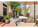 Inviting patio with comfortable seating, garden and stylish outdoor furniture for relaxation and entertaining at 10276 Cherry Brook St, Las Vegas, NV 89183
