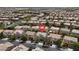 This is an aerial view of the home with a red marker on it, in a community near Huckleberry Park at 10631 Kennedy Peak Ln, Las Vegas, NV 89166
