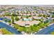 Stunning aerial view of community with pool, clubhouse, and well-maintained landscaping in a desirable neighborhood at 10631 Kennedy Peak Ln, Las Vegas, NV 89166