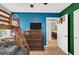 Vibrant ' bedroom featuring a bunk bed and a basketball hoop on the door at 10631 Kennedy Peak Ln, Las Vegas, NV 89166