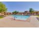 Large community pool offers a refreshing escape and a place to unwind and enjoy the outdoors at 10631 Kennedy Peak Ln, Las Vegas, NV 89166