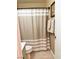 Bathroom featuring tile floors, neutral walls, and a shower with curtain at 1121 Majestic Canyon St, Henderson, NV 89052