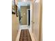 Hallway with clean, neutral-colored walls, floor, and decor at 1121 Majestic Canyon St, Henderson, NV 89052