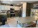 Well-equipped kitchen with stainless steel appliances, spacious countertops, and ample cabinet space at 1121 Majestic Canyon St, Henderson, NV 89052