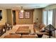 Comfortable living room featuring stylish decor, comfortable seating, and a unique wooden coffee table at 1121 Majestic Canyon St, Henderson, NV 89052