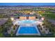 Aerial view of community pool and lounge, along with an additional pool at 117 Tardando Ave, Henderson, NV 89015