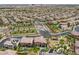 Expansive aerial view of community highlighting the well-maintained homes and landscaping at 11944 Dolcemente Ln, Las Vegas, NV 89138