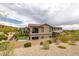 Beautiful backyard featuring a pool, manicured lawn, and lush landscaping, creating a private and serene outdoor space at 11944 Dolcemente Ln, Las Vegas, NV 89138