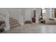 Inviting foyer featuring tile flooring and a staircase with white railing at 11944 Dolcemente Ln, Las Vegas, NV 89138