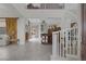 Spacious foyer with high ceilings, decorative furnishings, and open staircase at 11944 Dolcemente Ln, Las Vegas, NV 89138