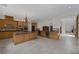 Gourmet kitchen with granite countertops, custom cabinetry, and stainless steel appliances at 11944 Dolcemente Ln, Las Vegas, NV 89138