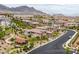 Picturesque neighborhood view of well-maintained homes and desert landscaping against a mountain backdrop at 11944 Dolcemente Ln, Las Vegas, NV 89138