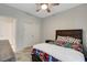 bedroom featuring a closet, ceiling fan, and plush carpet at 1634 Deep Valley Ave, North Las Vegas, NV 89084
