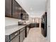Modern kitchen features granite countertops, stainless steel appliances, and ample cabinet space at 1634 Deep Valley Ave, North Las Vegas, NV 89084